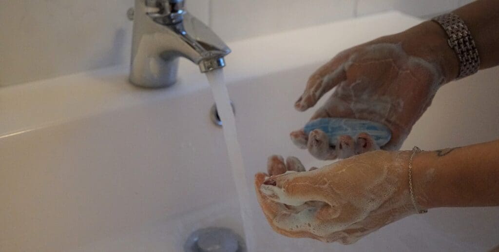 washing hands with bar soap