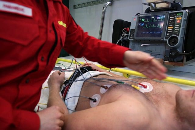 EMT working on heart patient